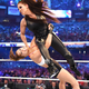 Ronda Rousey, one of the two women arguably most responsible for WWE’s current mainstream acceptance, suplexes the other, Stephanie McMahon, at WrestleMania 34 in April.